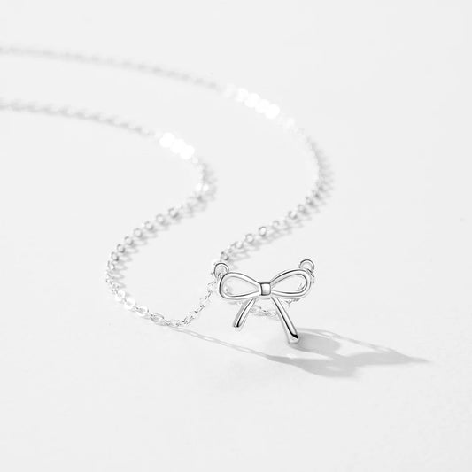 NYSSA - Sterling Silver Designer Inspired Bow Pendant Necklace